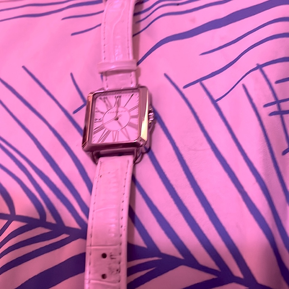Ann klien watch in white alligator with pretty white watch face. Scuff on band